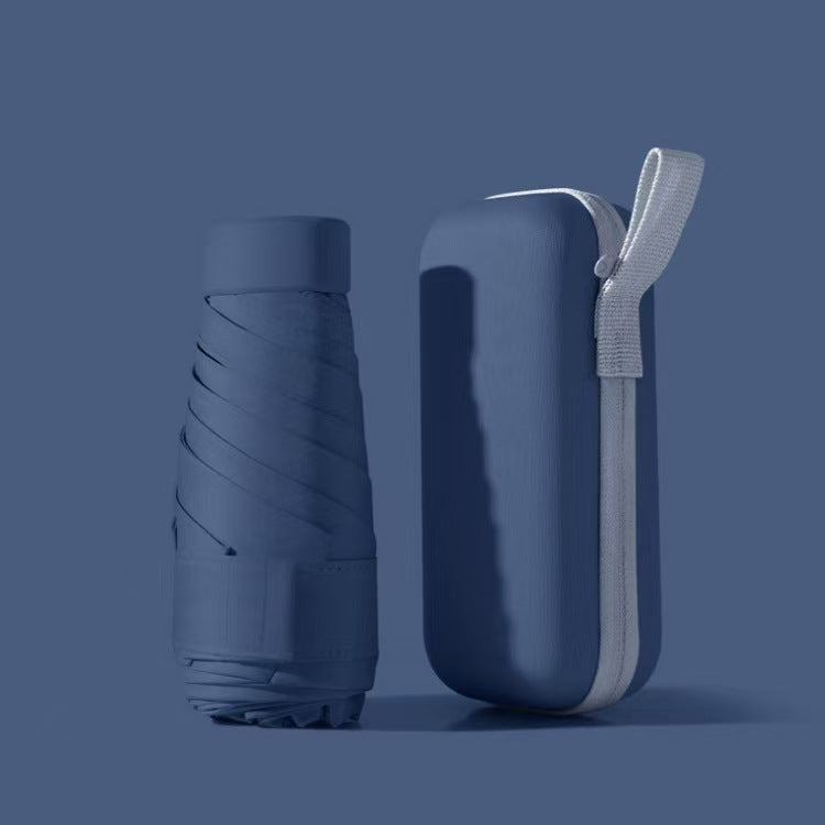 Small portable outdoor umbrella with waterproof case, essential for travel and daily commute.