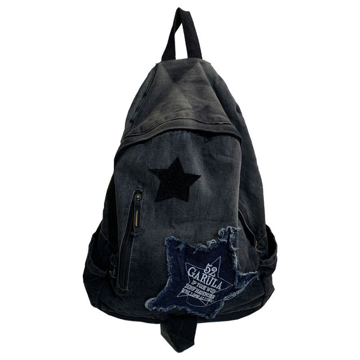 Stylish unisex denim backpack featuring star appliqué, perfect for school, travel, and everyday casual wear.