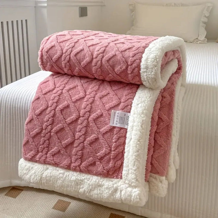 Warm unisex sherpa fleece blanket with elegant diamond knit design for home decor.