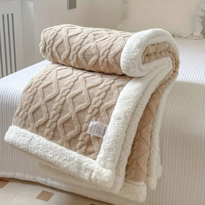 Luxurious diamond knit sherpa fleece blanket, soft and warm for ultimate comfort.