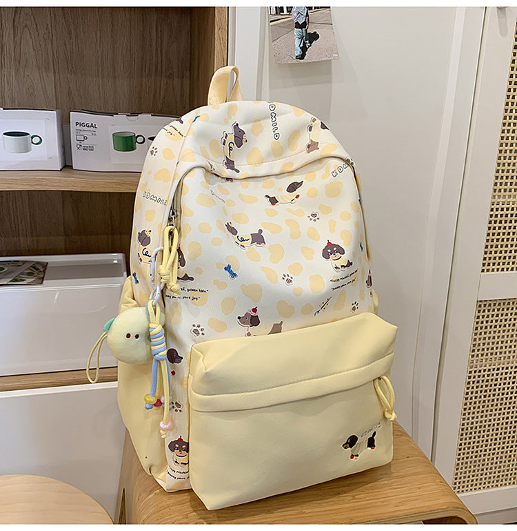 Durable unisex graphic backpack featuring a fun dog design. Great for daily use, school, or travel adventures.