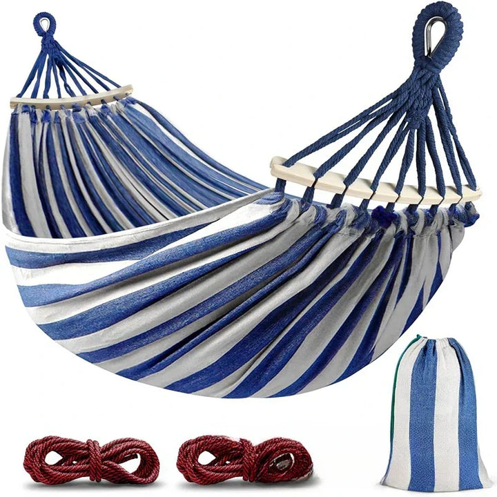 Unisex double canvas hammock featuring wooden spreaders for ultimate outdoor comfort in your garden or patio.