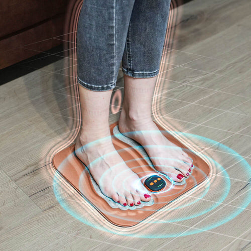 Foot nerve stimulation pad in use, targeting pain relief & improving circulation. Easy remote control operation.