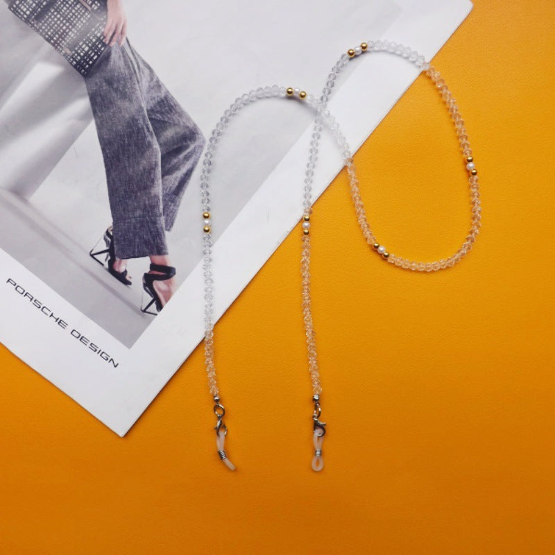 Elegant gold-colored glasses chain, a practical anti-slip holder and accessory.