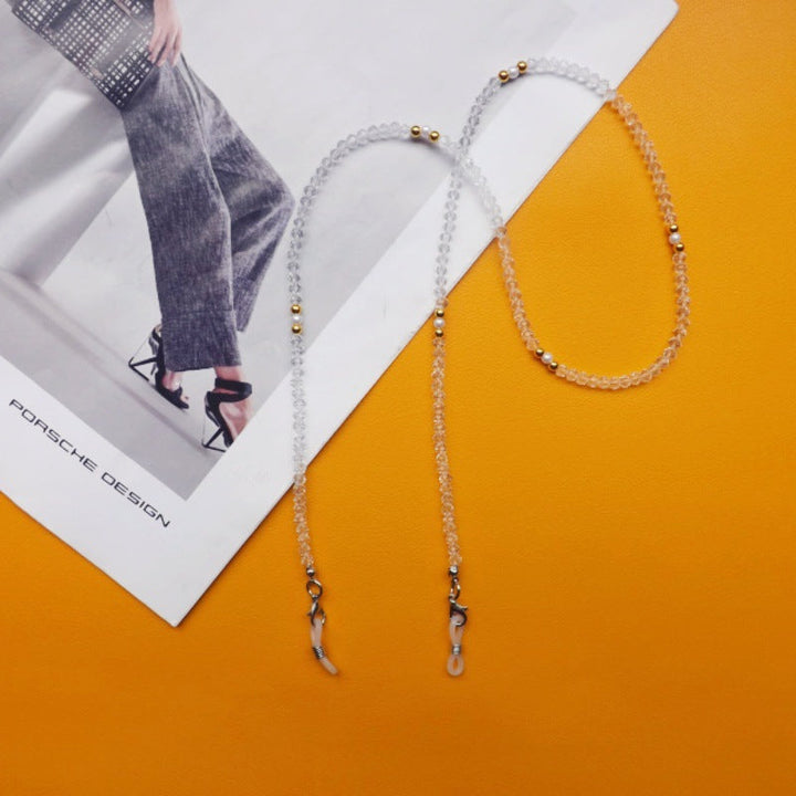 Elegant gold-colored glasses chain, a practical anti-slip holder and accessory.