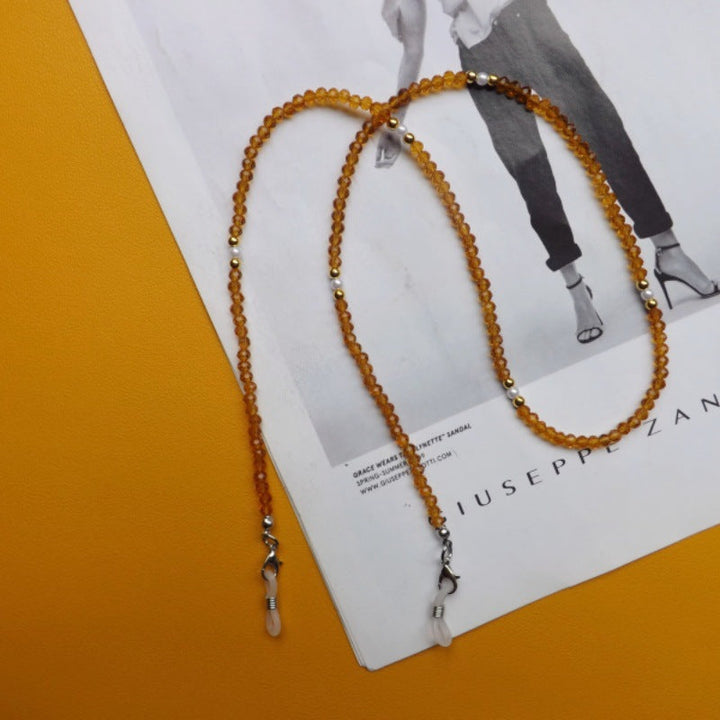 Anti-slip spectacle holder chain, stylish and secure for everyday use.