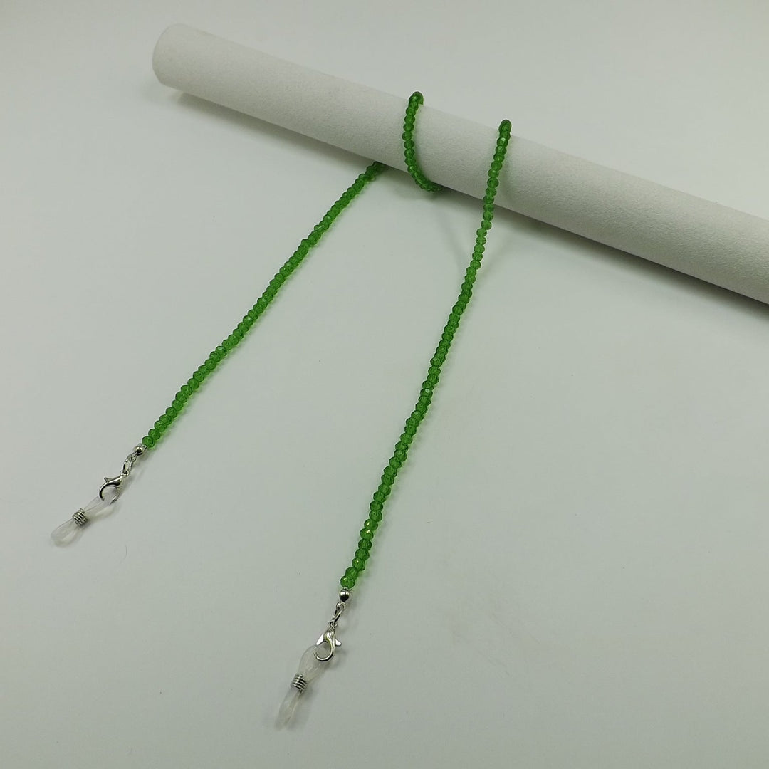 Fashion-forward unisex glasses holder with sparkling glass beads.