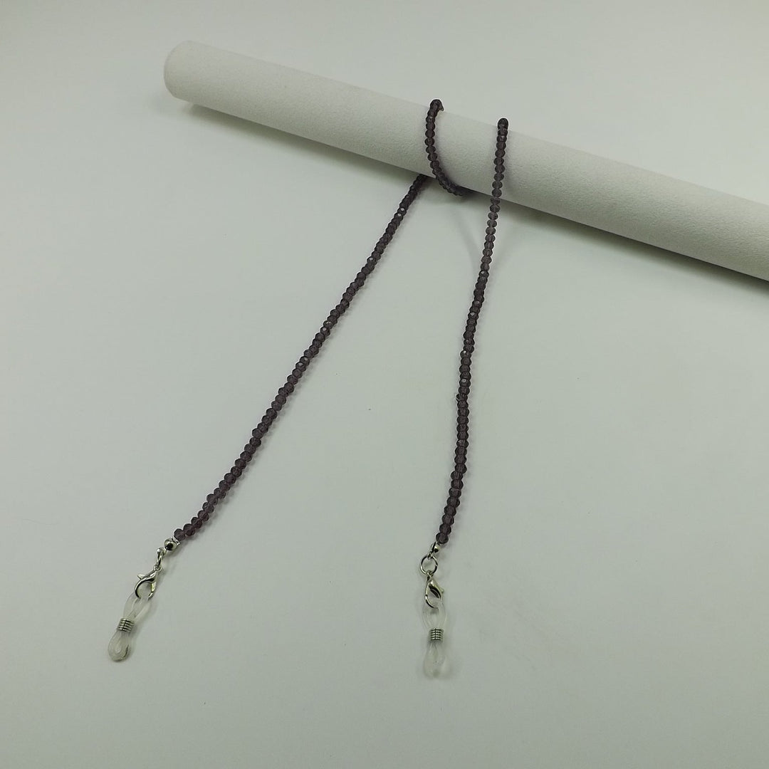 Elegant glass bead strap, versatile for glasses or as a long necklace.
