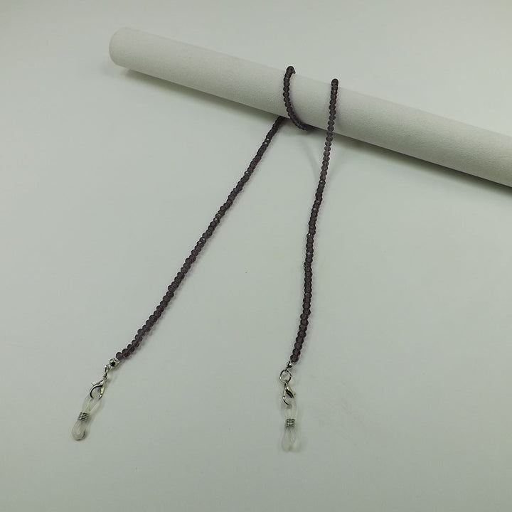 Elegant glass bead strap, versatile for glasses or as a long necklace.