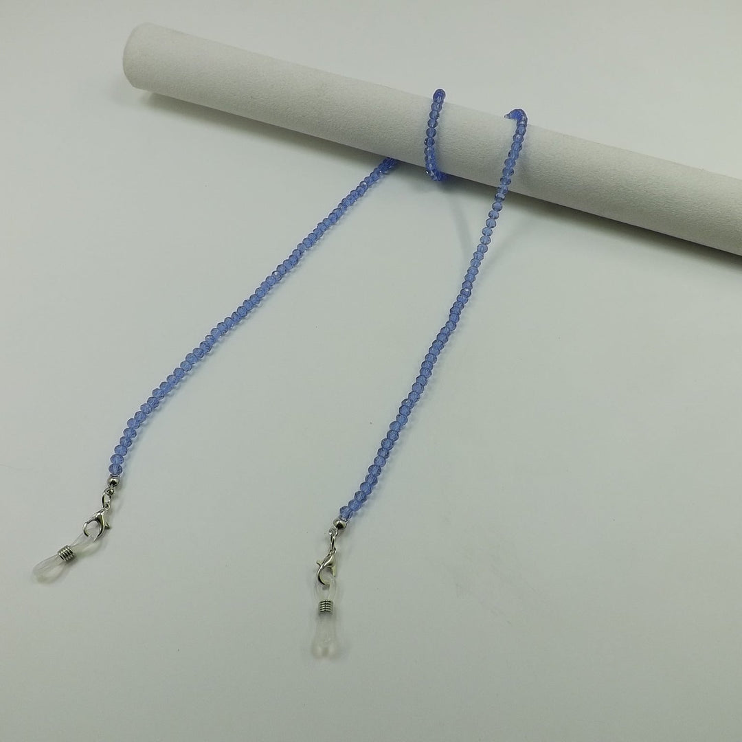 Stylish crystal necklace & glasses chain, a sophisticated dual-purpose item.