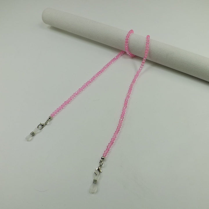 Stylish crystal bead eyewear strap and versatile fashion necklace.