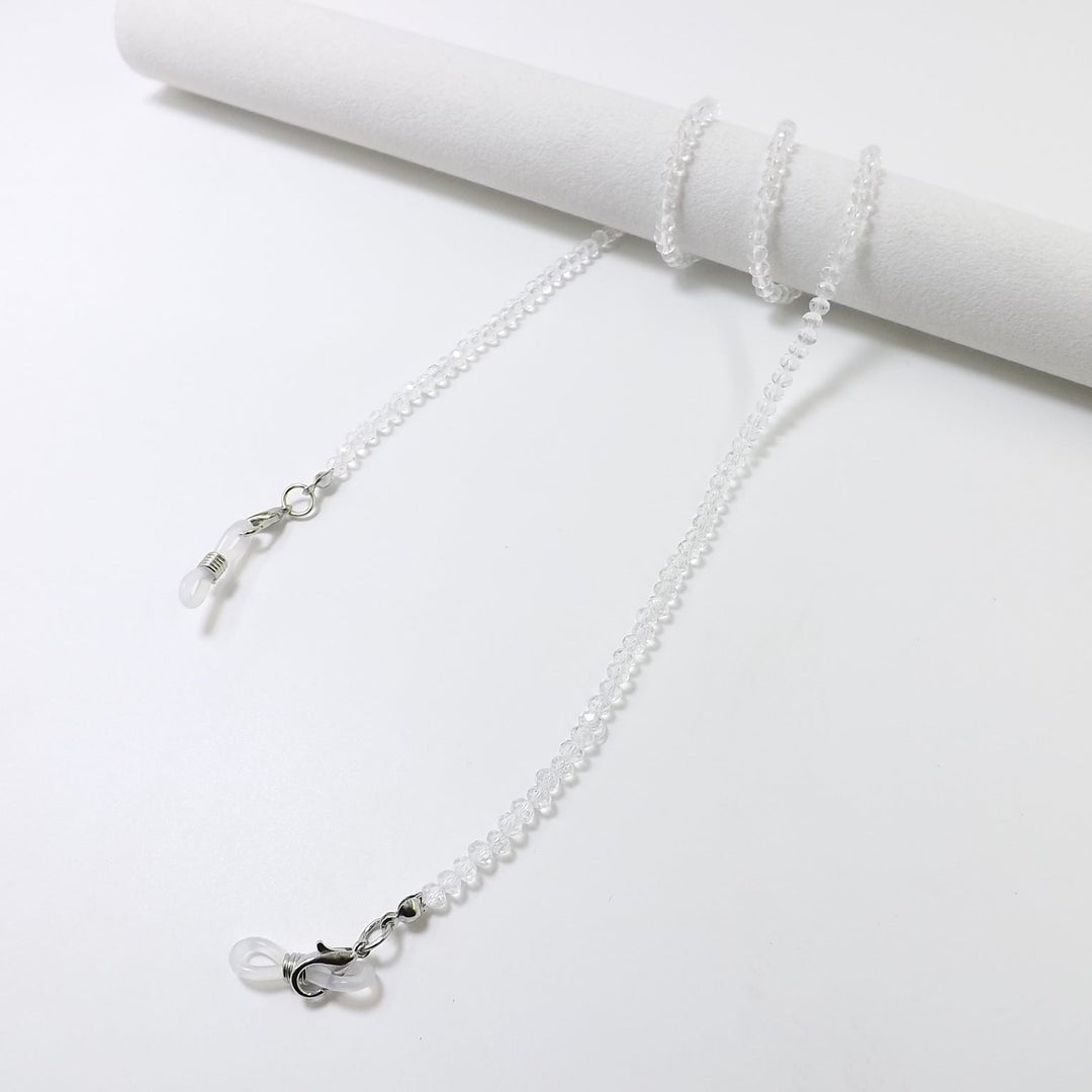 Versatile glass bead accessory: elegant necklace & eyewear strap.