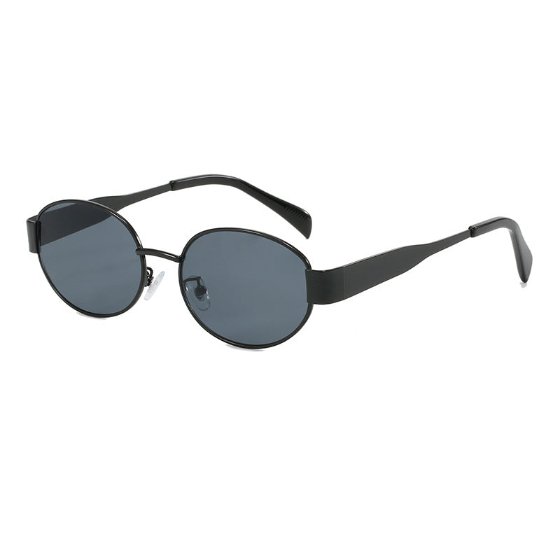 Elegant oval metal frame sunglasses. Unisex eyewear accessory providing stylish UV protection.