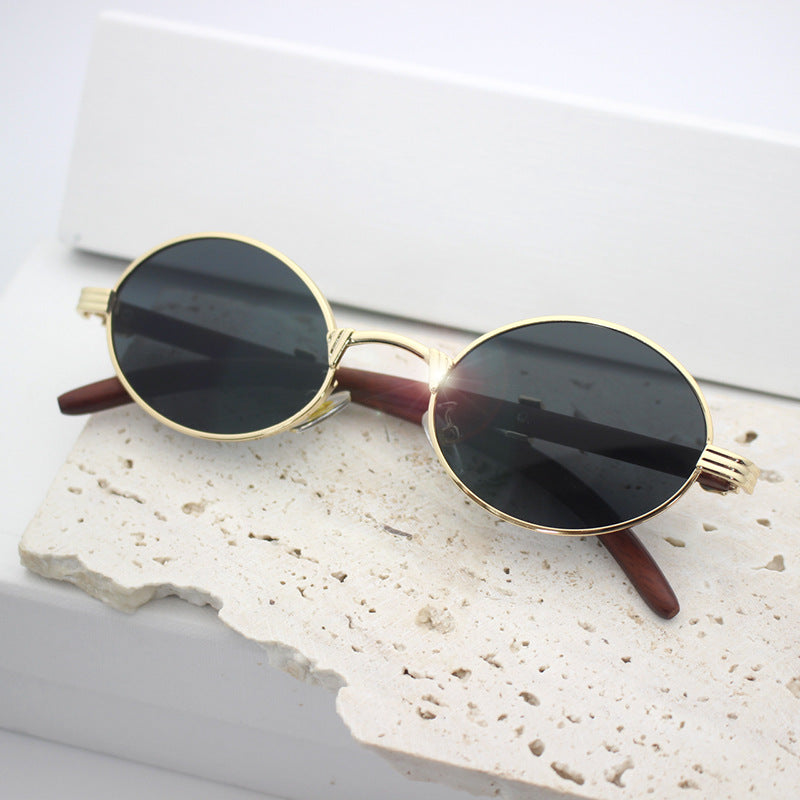 Unisex elegant round sunglasses with metal frame and UV protection, perfect for summer style.