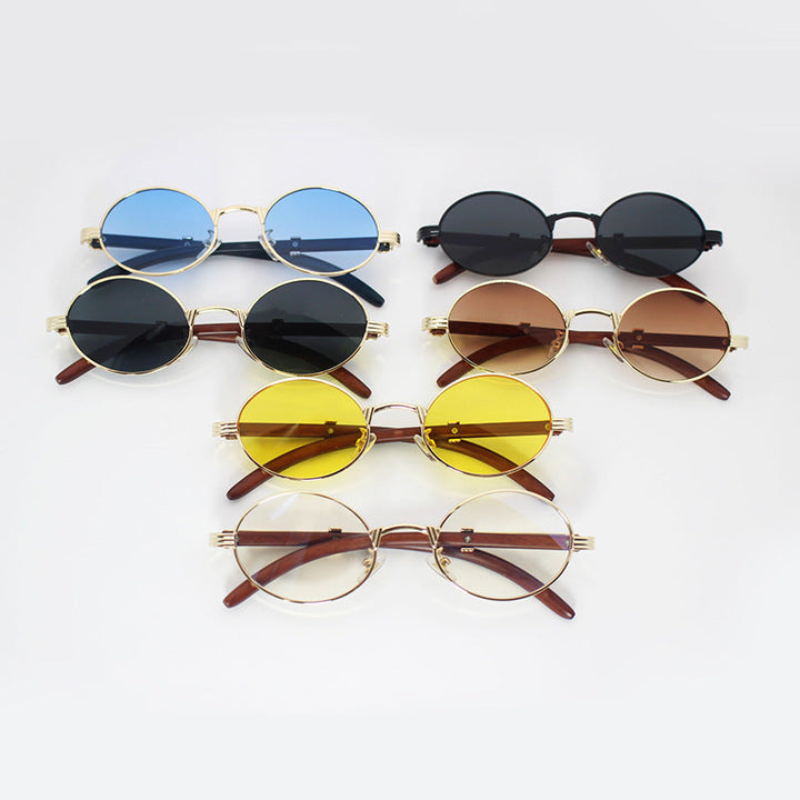 UV protection round sunglasses for men & women, an elegant metal frame eyewear accessory.