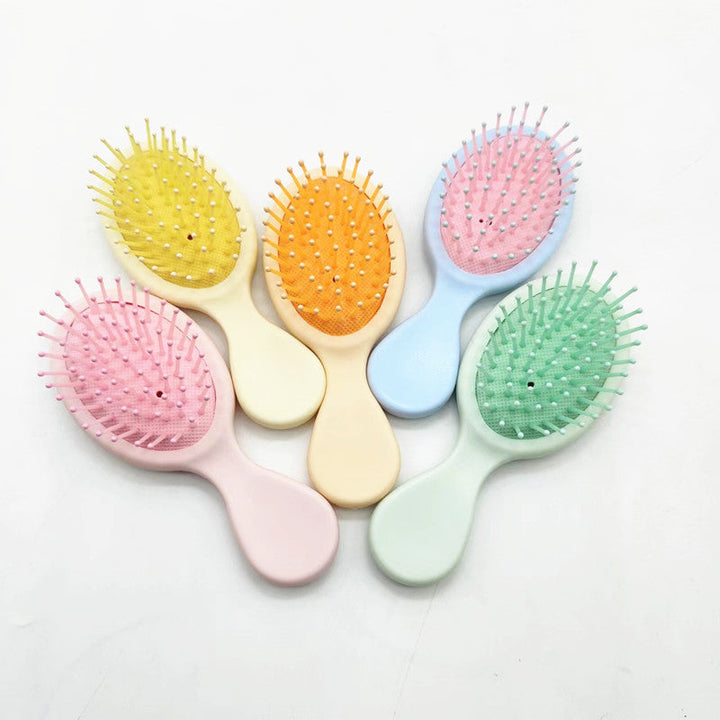 Unisex ergonomic detangling hair brush for smooth, shiny hair & frizz control.