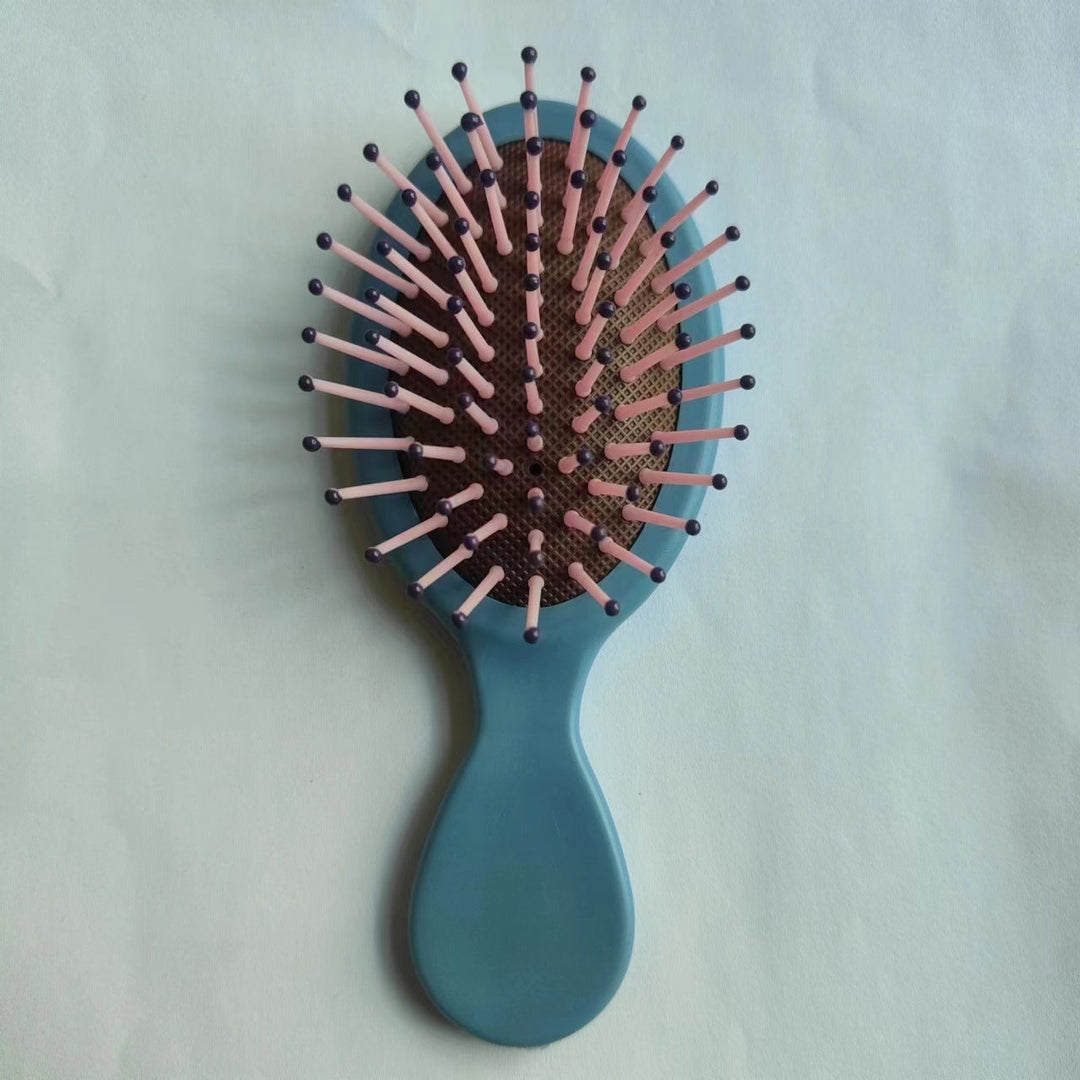 Styling essential: ergonomic detangling brush for sleek, shiny hair results.