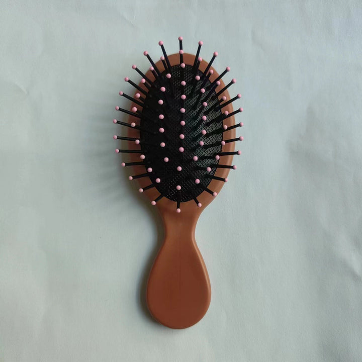 Hair tool for smooth, shiny hair: anti-static, detangling, straightening brush.