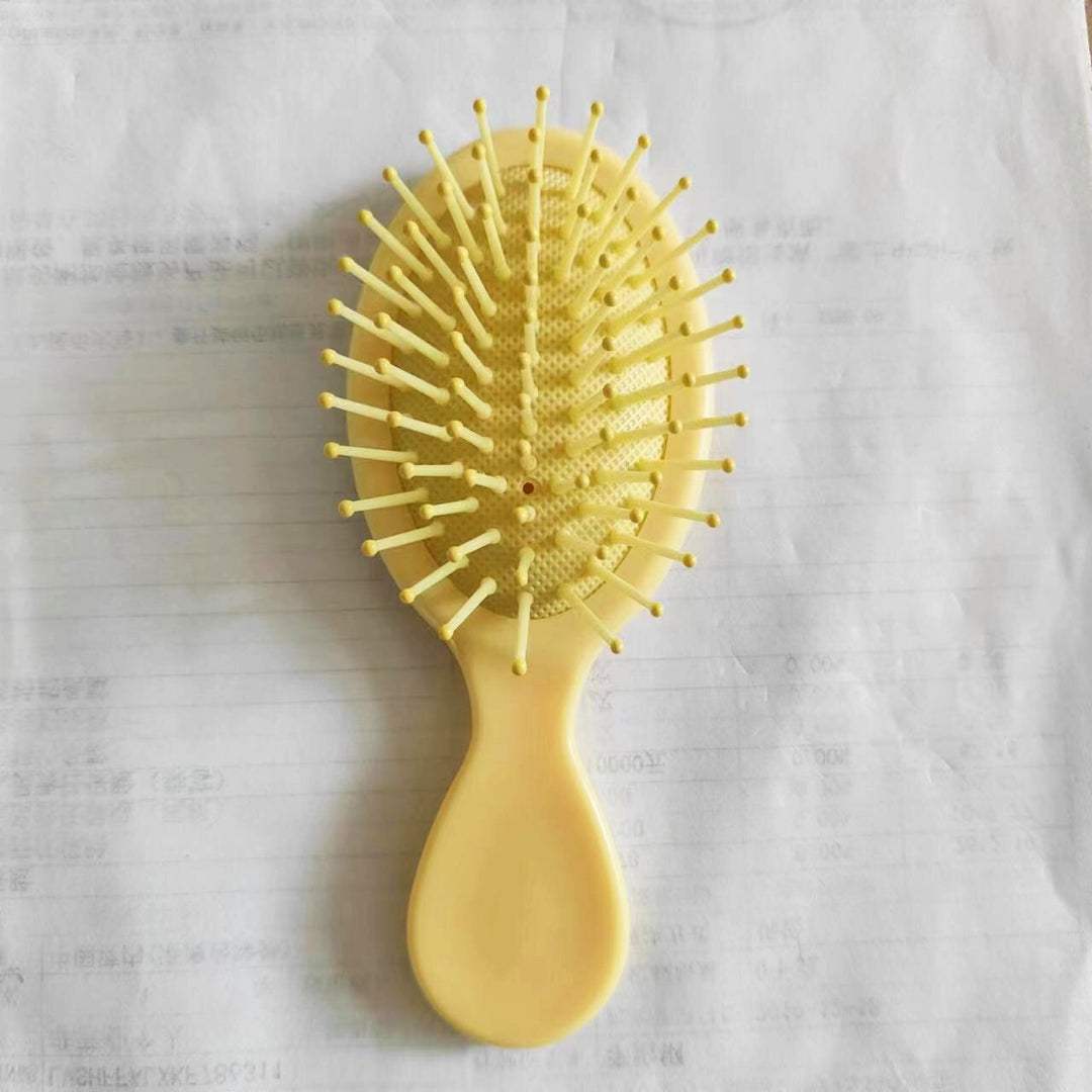 Ergonomic hair brush, anti-static for gentle detangling & smooth hair styling.