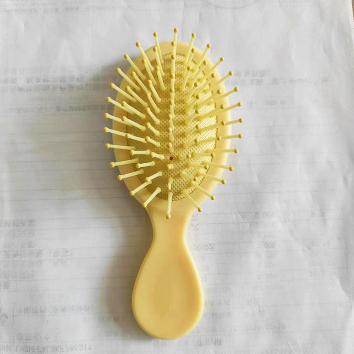 Ergonomic hair brush, anti-static for gentle detangling & smooth hair styling.
