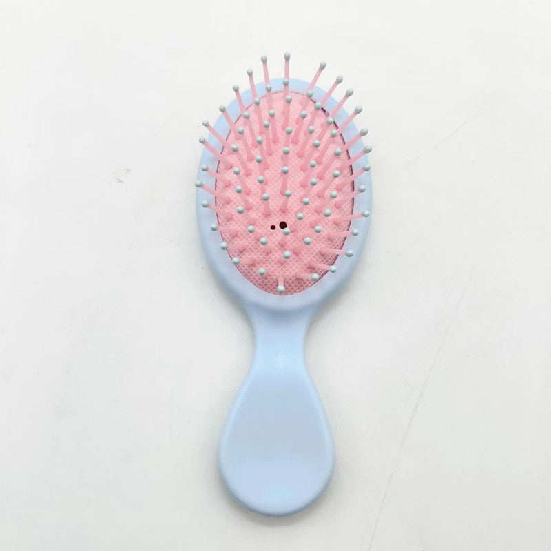 Ergonomic paddle brush for gentle detangling & frizz reduction, healthy hair.