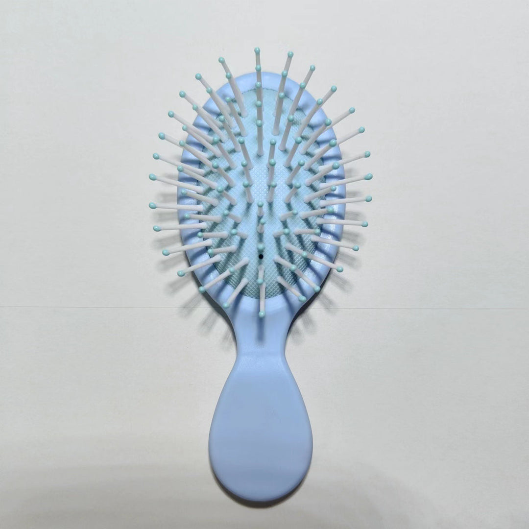 Straightening hair brush for shiny, smooth hair, reduces frizz & tangles.
