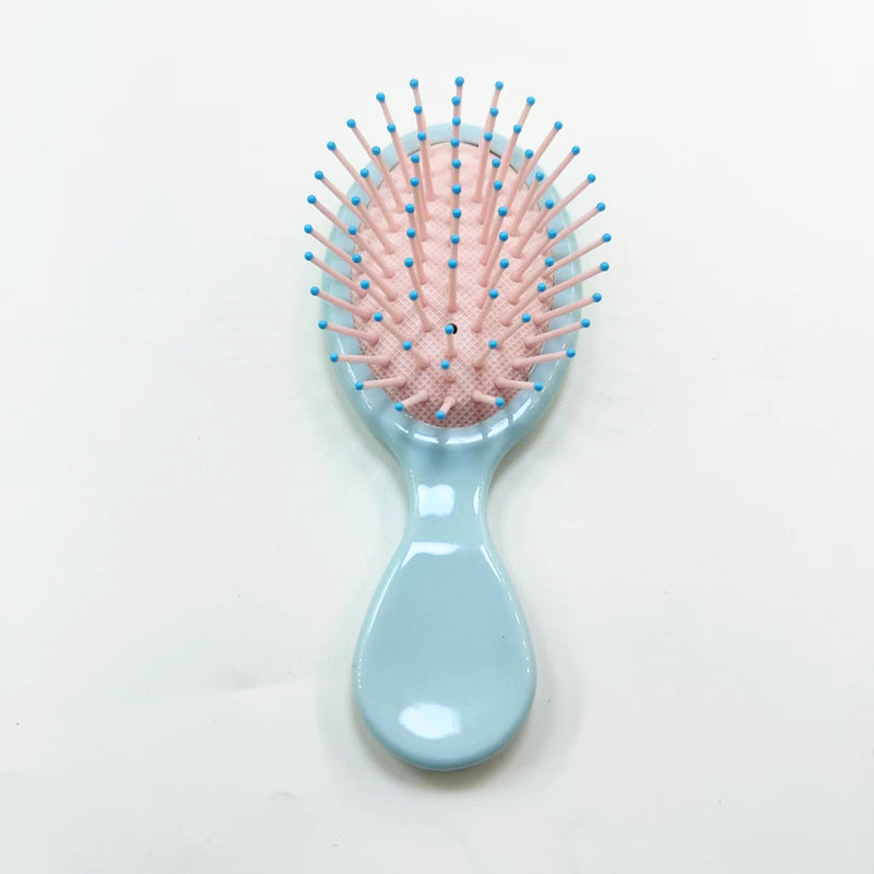 Say goodbye to knots with this gentle ergonomic hair comb, designed for effortless detangling.