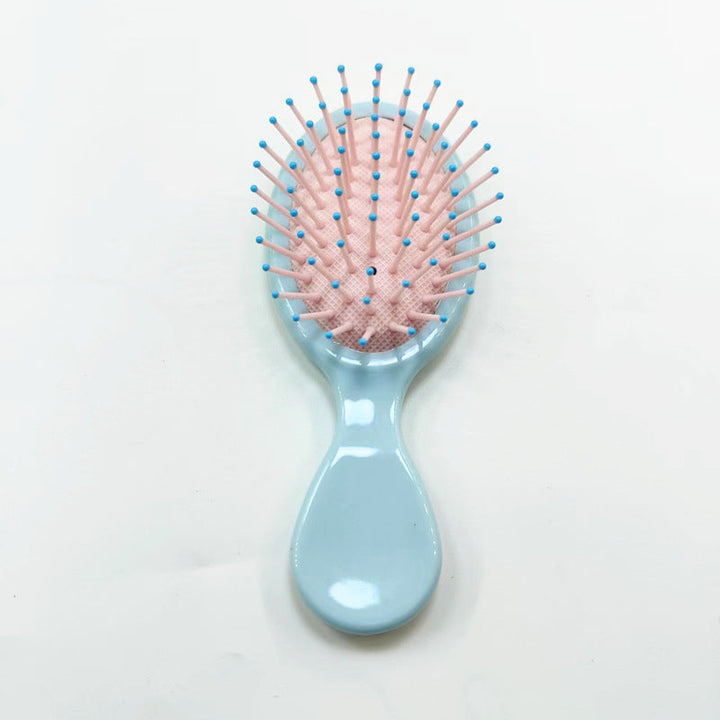 Say goodbye to knots with this gentle ergonomic hair comb, designed for effortless detangling.