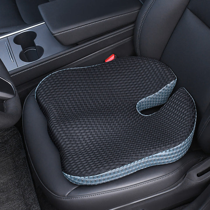 Unisex ergonomic memory foam car seat cushion for posture correction & back pain relief. Enhances driving comfort.
