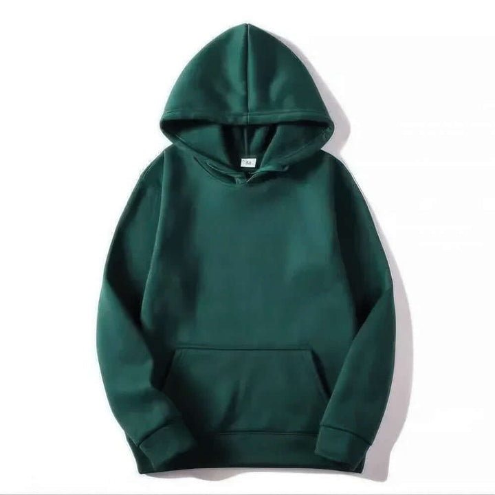 Woman in a blue Unisex Comfort Hoodie, perfect athletic casual pullover for layered fashion.