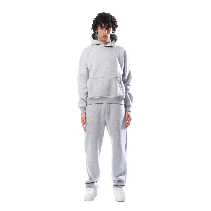 Everyday unisex comfort tracksuit. Relaxed fit ensures ease for loungewear, travel, and casual style.