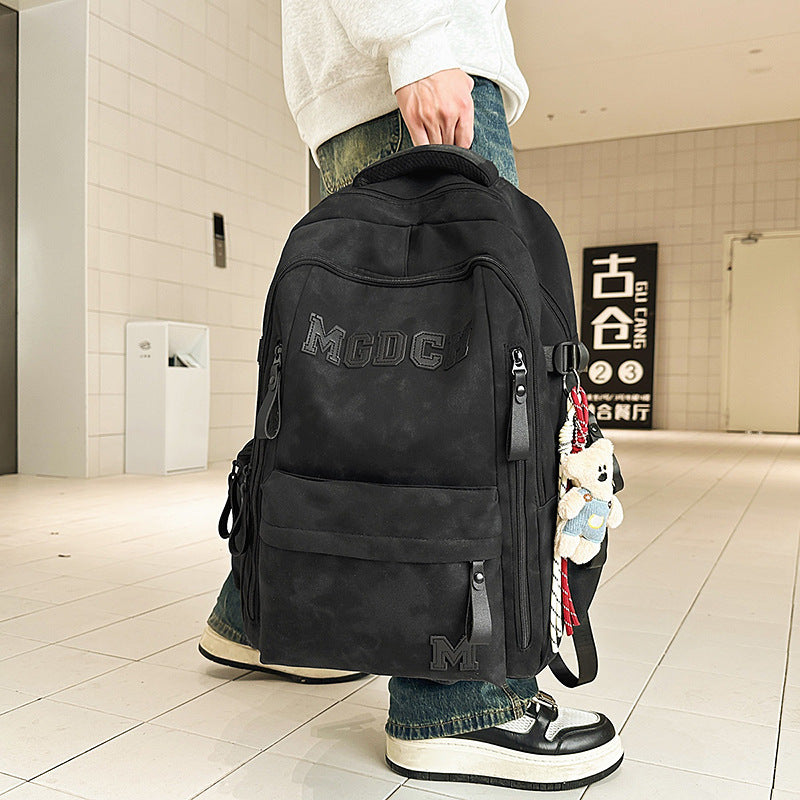 Durable unisex laptop backpack, perfect for daily commute & travel, offering secure storage and comfortable wear.