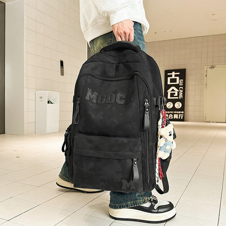 Durable unisex laptop backpack, perfect for daily commute & travel, offering secure storage and comfortable wear.