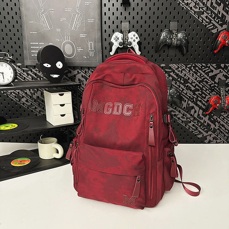 Versatile travel utility backpack, suitable for men & women, with ample space for essentials & a modern, sleek look.