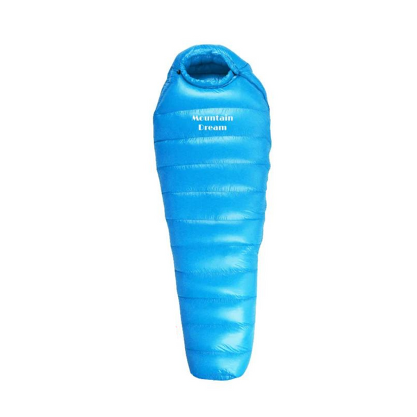 Extreme cold -20°C winter sleeping bag beside a tent in snowy mountains. Perfect for outdoor adventure.