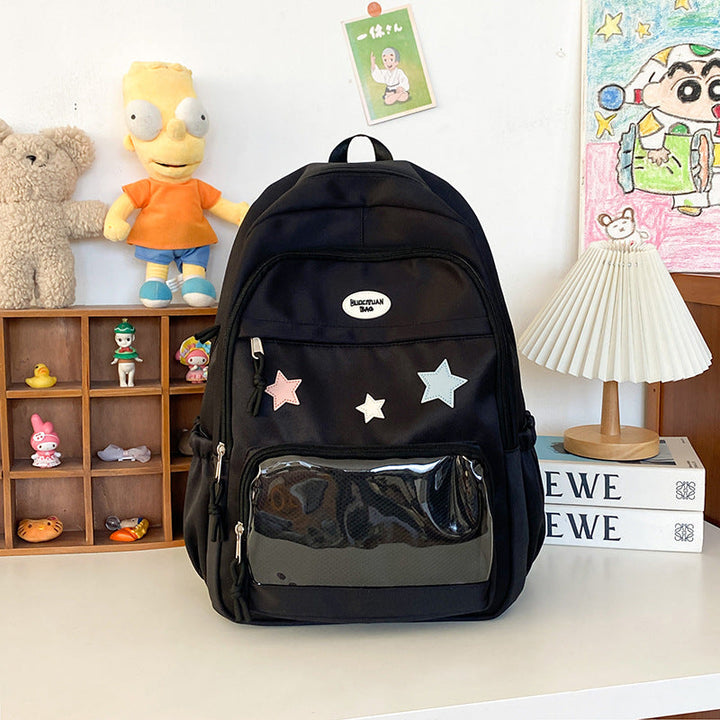 Spacious star appliqué unisex backpack for travel, school, and everyday use. Comfortable & durable fashion design.