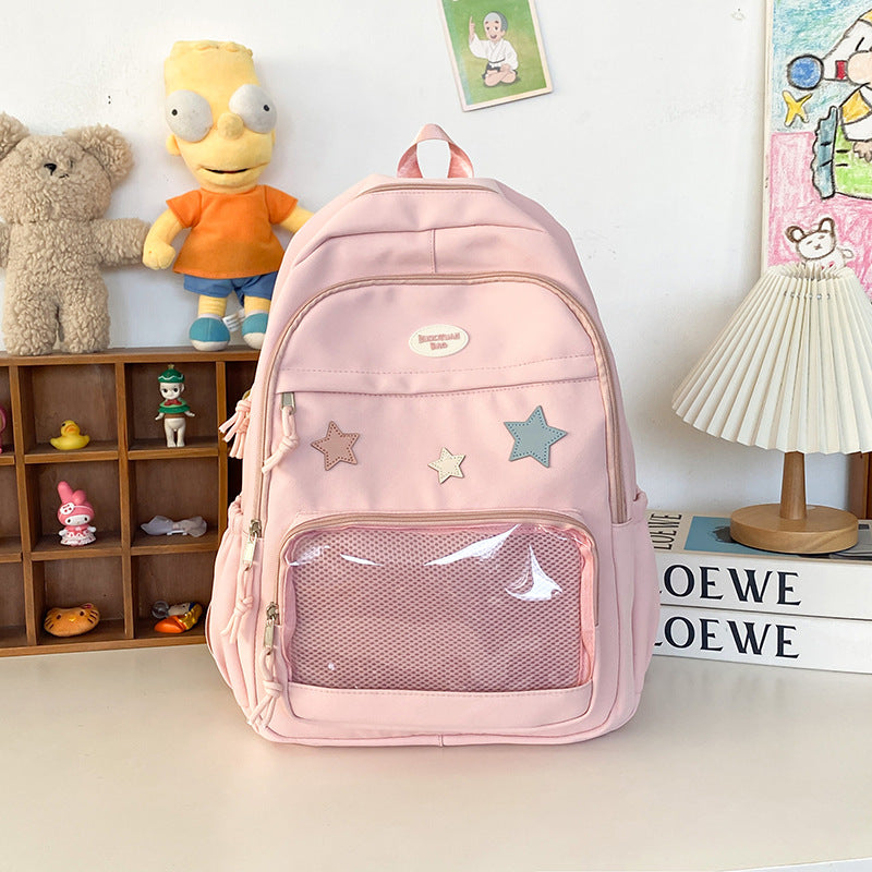 Close-up of a stylish star appliqué on a versatile unisex fashion backpack. Ideal for students & casual outings.