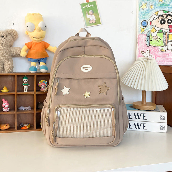 Trendy unisex student backpack with star appliqué, perfect for travel, school, or a casual fashion statement.