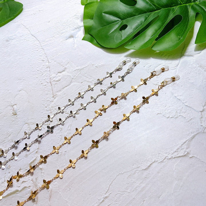 Unisex fashion glasses holder chain with delicate flower pendants. Perfect eyewear accessory & spectacle holder.