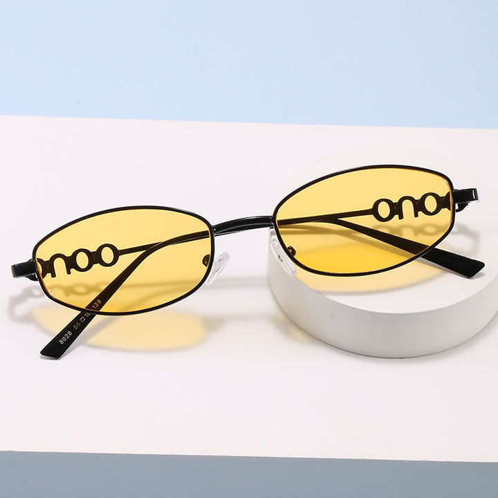 Modern oval sunglasses with protective lenses, ideal fashion eyewear for a trendy style.