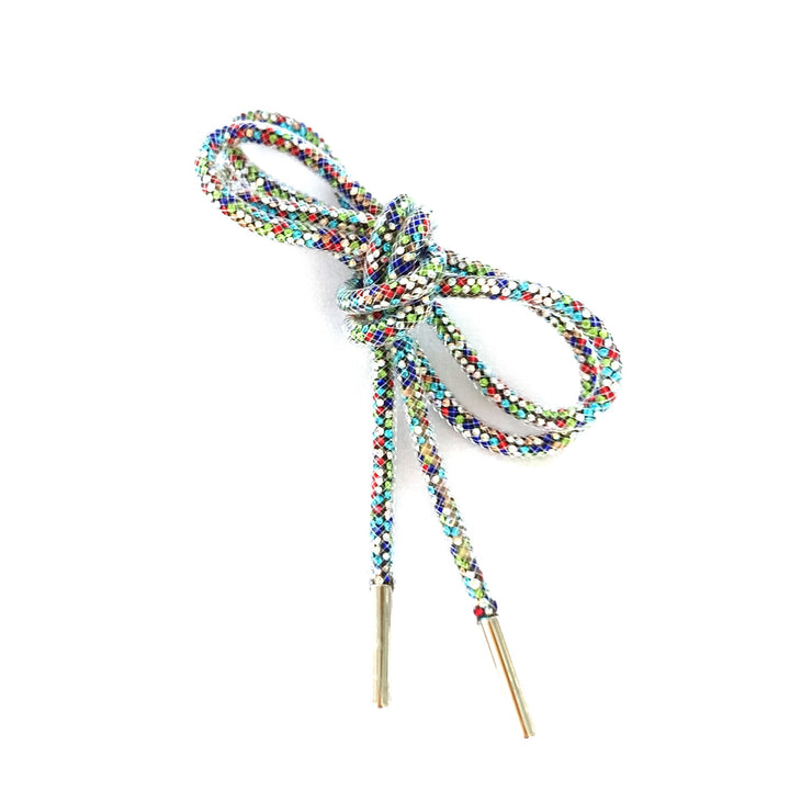 Eco-friendly recycled material shoe laces in natural beige, strong and stylish unisex fashion accessory.