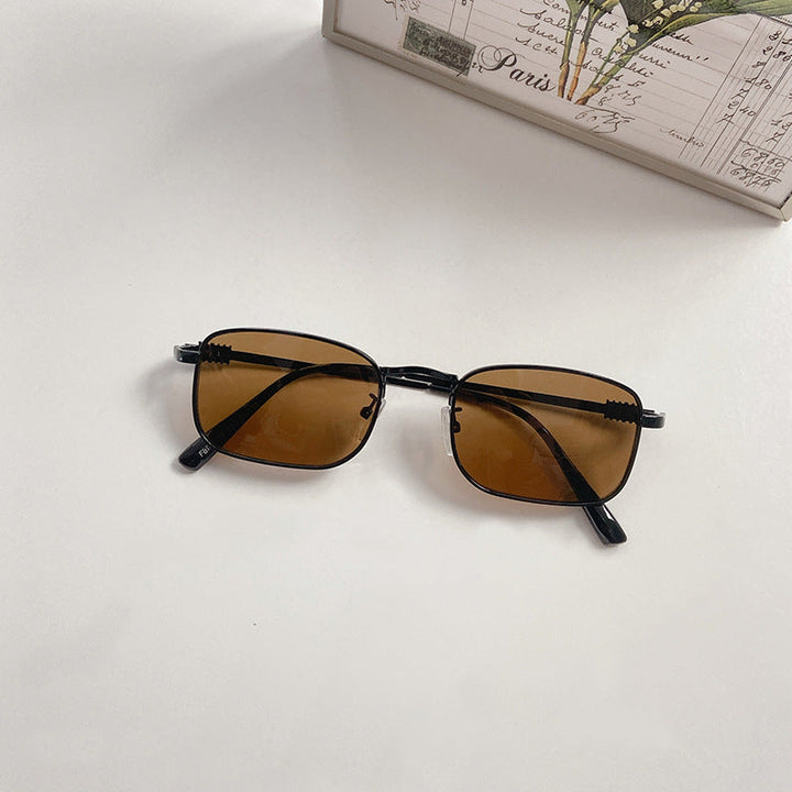 Unisex fashion square frame glasses with clear lenses, stylish for all.