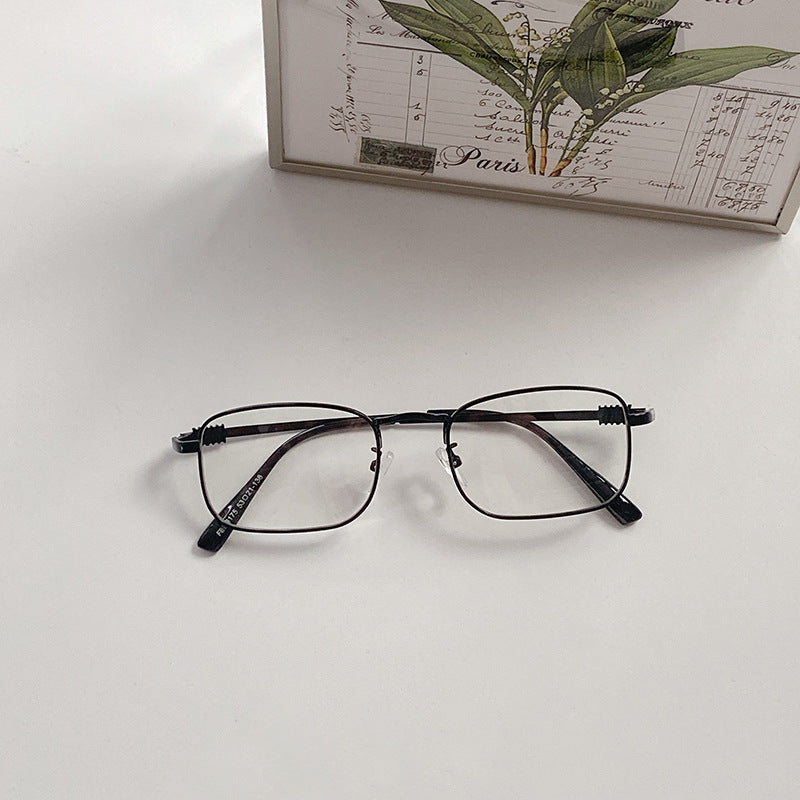 Chic clear square frame glasses, a trendy fashion accessory for modern individuals.