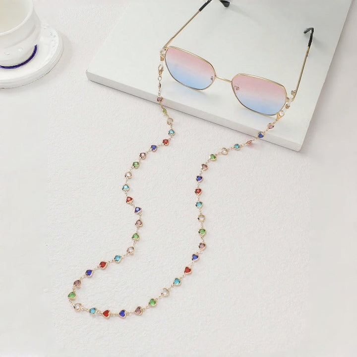 Contemporary blue stone fashion chain for sunglasses, a unique unisex eyewear accessory.