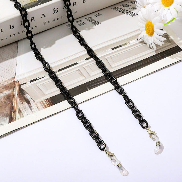 Chic unisex chain for holding eyeglasses or face masks in a fashionable way.