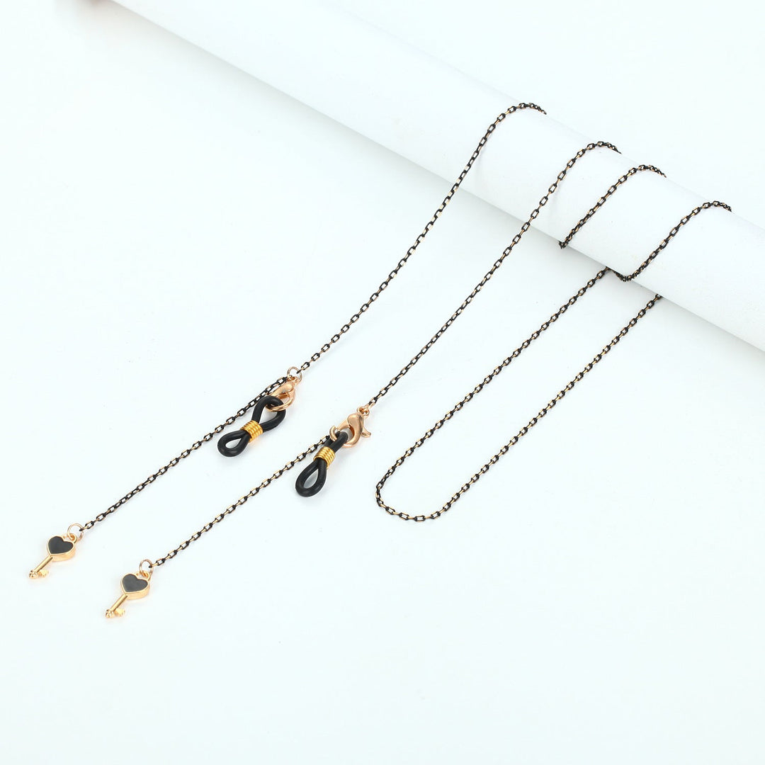 Modern metal alloy glasses holder necklace with a sleek, minimalist loop pendant design.