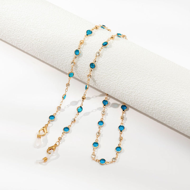 Sleek silver-tone sunglasses chain, minimalist yet decorative fashion accessory for glasses.