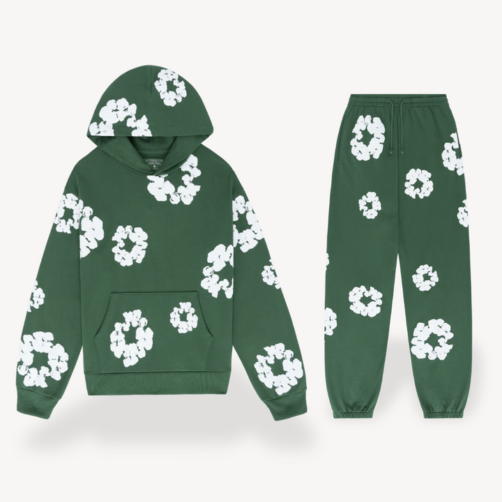 Vibrant floral graphic print detail on the comfortable unisex hoodie and jogger set fabric.