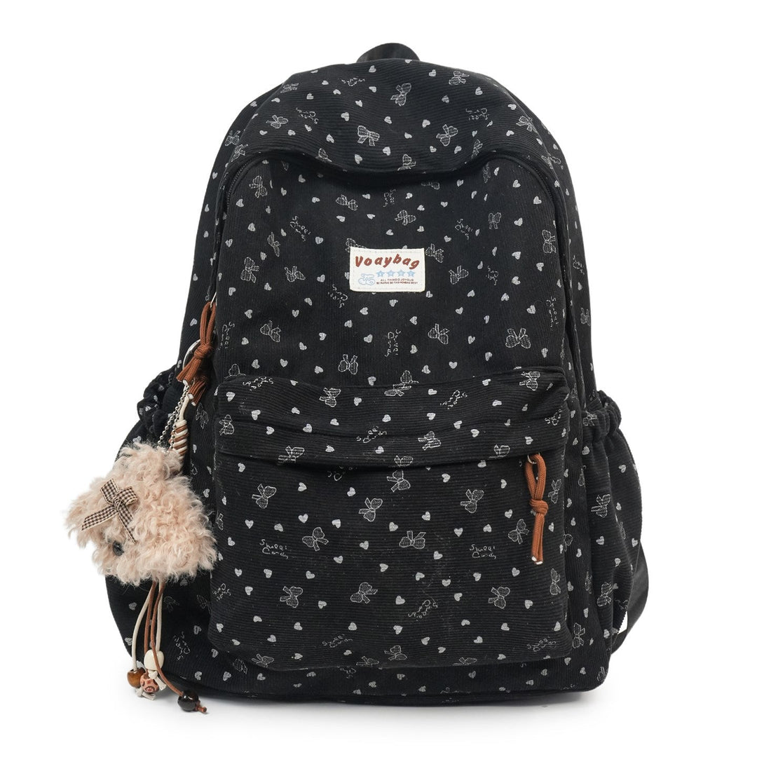 Close-up of elegant floral pattern on a durable unisex backpack. Ideal for work, travel, or daily use.
