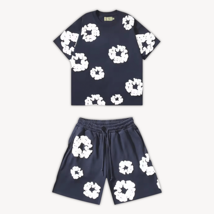 Stylish coordinated unisex floral tee and shorts set. Vibrant print for a comfortable and relaxed summer outfit.